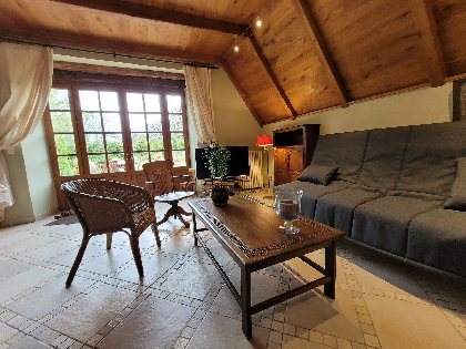 Le séjour et sa grange baie vitrée de plain pied sur la terrasse, Domaine de Bellevue - Alain Prieur