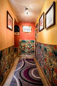 L'entrée avec sanitaires et douches, Gîte La Jeanne