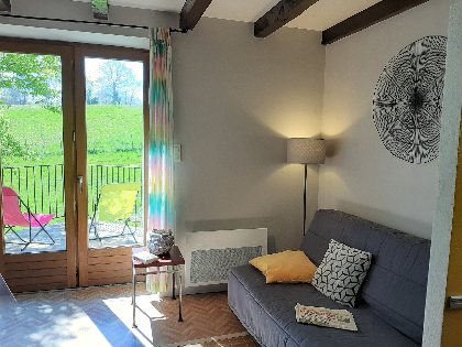 Coin séjour Gîte La Grange , OFFICE DE TOURISME de CONQUES-MARCILLAC