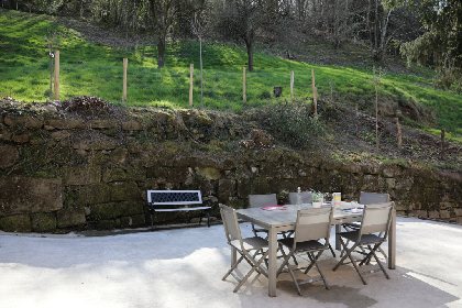 Dans un cadre verdoyant, propriétaire