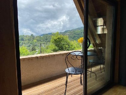 Doux Refuge. Le balcon et sa vue depuis la chambre, Gite Le Clos St Georges